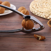 Luxury stainless steel walnut cracker, top-down view