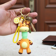 Cartoon giraffe keychain showing spring neck feature