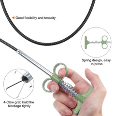 Close-up of hand grip on spring drain cleaner tool
