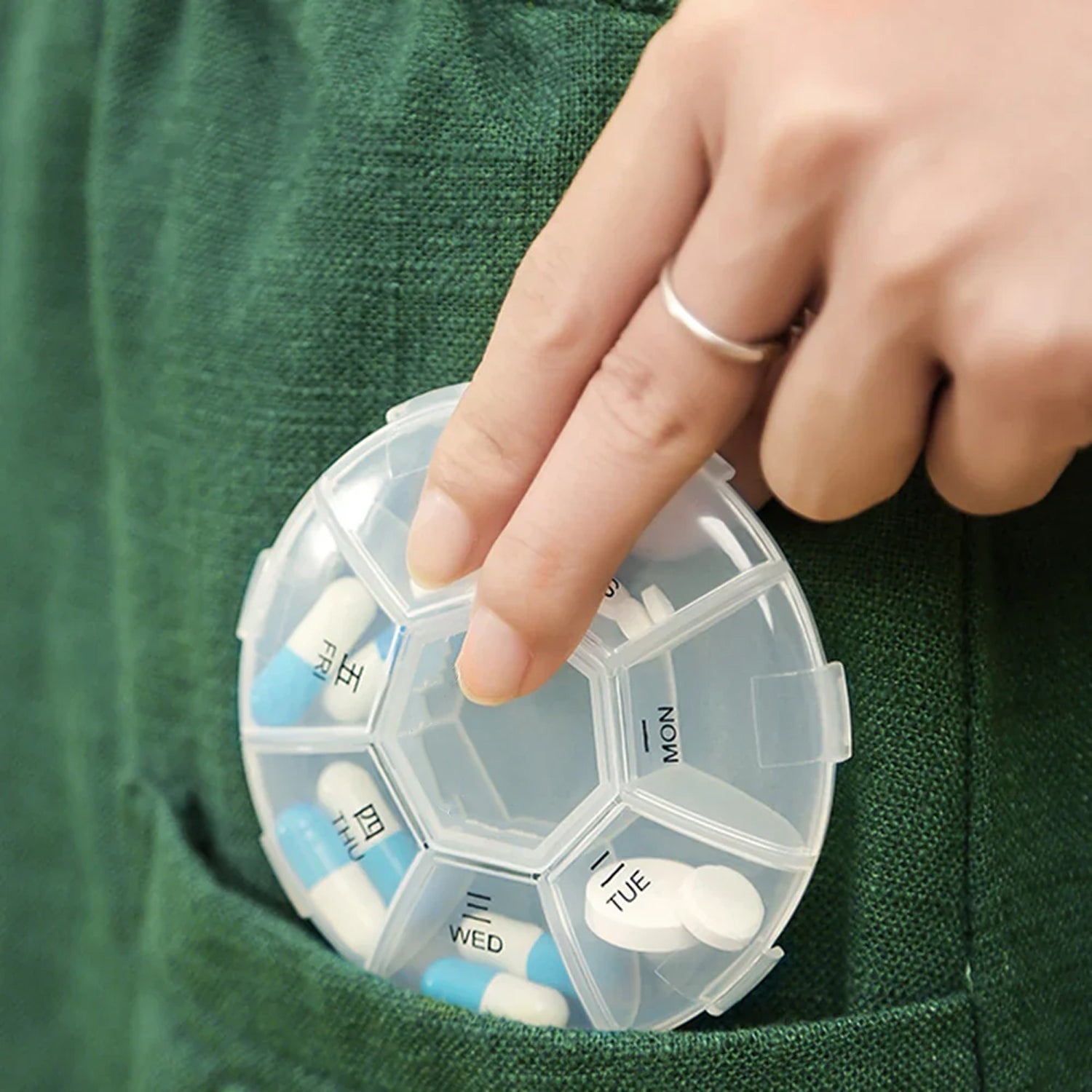 7-sided portable weekly pill box with clear lids