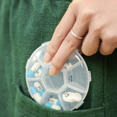 7-sided portable weekly pill box with clear lids