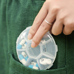 7-sided portable weekly pill box with clear lids