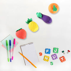 Close-up of colorful mini fruit and vegetable erasers