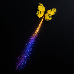 LED butterfly hair clip glowing in party light