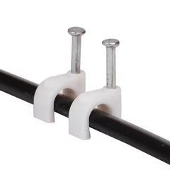 Close view of plastic U-shape 8mm nail cable clips with steel nails