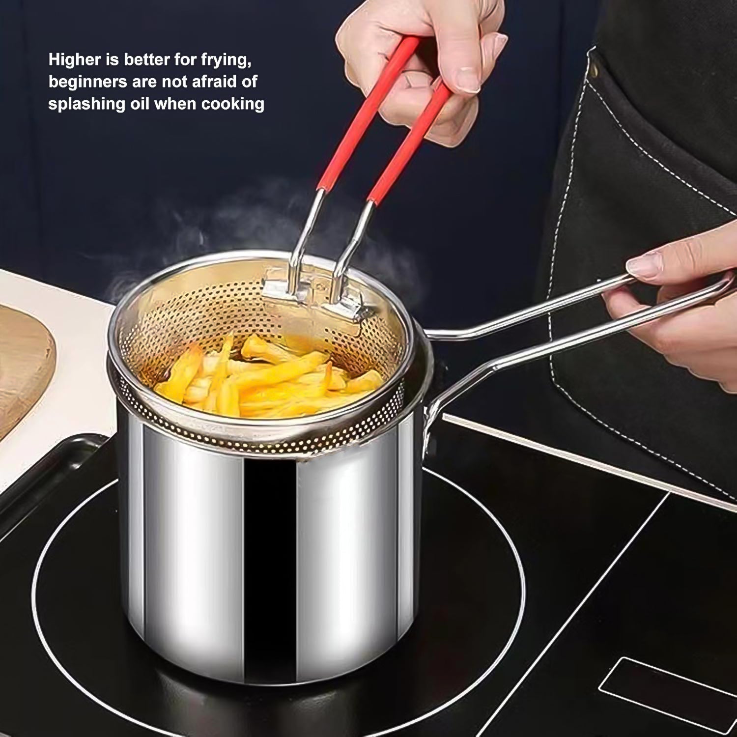 Small deep frying pot with strainer basket cooking fries