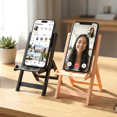 Mini chair phone stand holding smartphone on desk