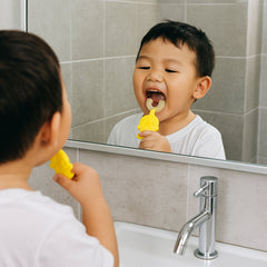 Baby toothbrush with easy-grip duck handle