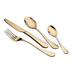 Close-up of gold cutlery pieces