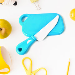 Assortment of vibrant toy fruits and vegetables ready for slicing