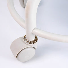 Low rolling stool with comfortable cushioned seat and wheels