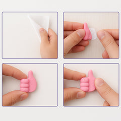 Flexible pink hand-shaped clip holding an item