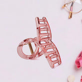 Simple matte plastic hair clamp angled view
