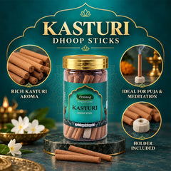 A jar of dhoop sticks on a marble stand, with a lit stick, loose sticks, and white flowers.