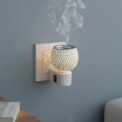 Kapoor Dani aroma diffuser plugged into a wall socket