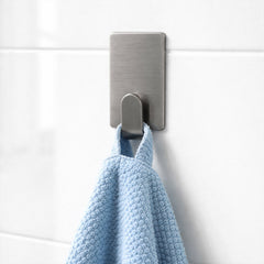 Pack of multiple adhesive wall hooks