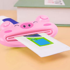 Animal design toothpaste tube squeezer on a bathroom counter