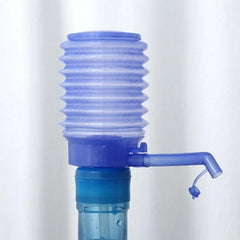 Side view of manual water pump for kettles