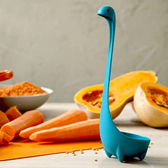 Silicone soup spoon resting on kitchen table