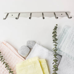 Wall mounted coat rack in modern home setting