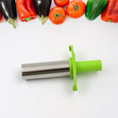 Chili corer removing seeds from a pepper