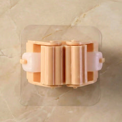 Holder clip securing cleaning tools