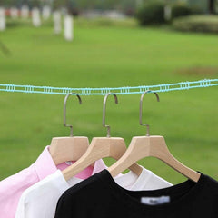 Clothesline rope stretched between two points outdoors with clothes hanging