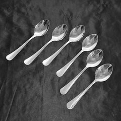 Elegant polished stainless steel dining spoons