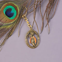 Close-up of Lord Krishna keychain's detailed engraving
