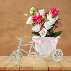 Close-up of bicycle flower pot stand wheels and design