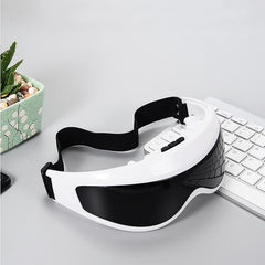 Close-up of eye massager control buttons