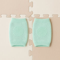 Close-up of soft mint green wool leg warmers