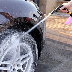 Spray gun nozzle rotating to adjust spray patterns