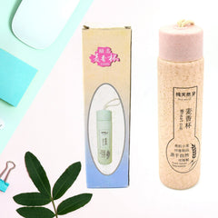 Close-up of 350ml glass water bottle with bamboo lid