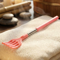 Khujli Stick in hand demonstrating anti-slip grip
