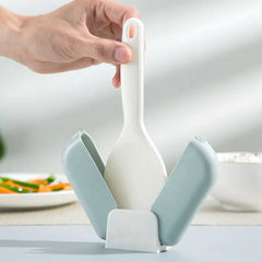 Transparent dust cover on automatic rice spoon holder