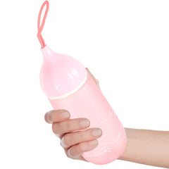 Water bottle with carrying dori strap attached to cap