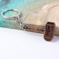 Metal hammer keychain holding keys