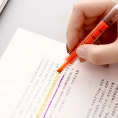 Close-up of highlighter marker tip showing vibrant ink