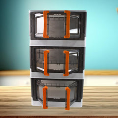 Folded plastic storage organizer showing collapsible feature