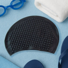 Textured grip dots on Konex silicone swimming cap