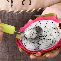 Close-up of stainless steel melon baller scoops