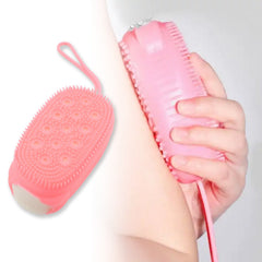 Ultra-soft silicone scrubber with dual surfaces for body exfoliation.