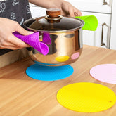Silicone trivet hot pad protecting table from hot pot
