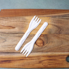 Single compostable bagasse fork, close-up
