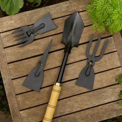 Close-up of garden hand tool kit with wooden handles