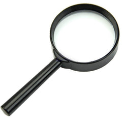 Magnifying glass on a newspaper for reading