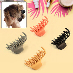 Matte hair claw clip holding hair