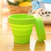 Foldable silicone travel mug with lid collapsed