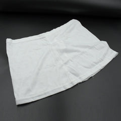 Women's high-waisted athletic skort front view in white